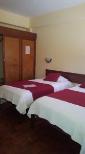 Letto o letti in una camera di Aparthotel Avenida