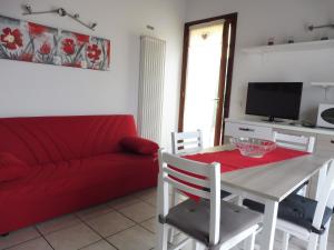 TV/trung tâm giải trí tại Villaggio Laguna app.to 5 e 38