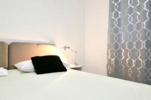 Posteľ alebo postele v izbe v ubytovaní Antonia Apartments
