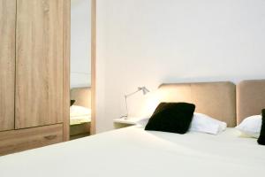 Posteľ alebo postele v izbe v ubytovaní Antonia Apartments