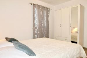 Posteľ alebo postele v izbe v ubytovaní Antonia Apartments