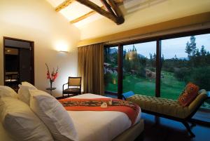 Postel nebo postele na pokoji v ubytování Rio Sagrado, A Belmond Hotel, Sacred Valley