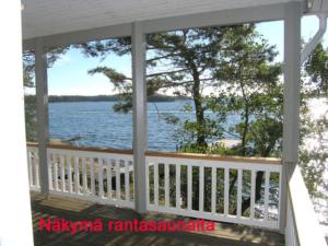 a view of the water from the porch of a house at Holiday Home Villa merituuli by Interhome in Haverö