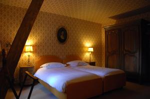 Кровать или кровати в номере B&B Le Moulin de Resteigne