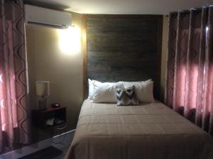 Voodi või voodid majutusasutuse Villegiature Deux Rivieres Resort toas