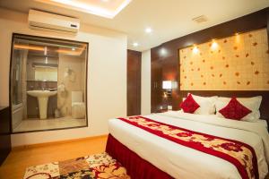 Voodi või voodid majutusasutuse Hotel Harrison Palace toas