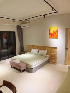 เตียงในห้องที่ C.C. Sleep