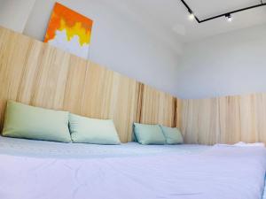 เตียงในห้องที่ C.C. Sleep