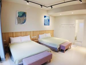 เตียงในห้องที่ C.C. Sleep