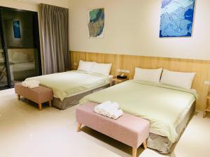 เตียงในห้องที่ C.C. Sleep