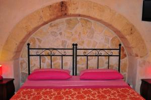 Postel nebo postele na pokoji v ubytování Ambrosia Bed & Breakfast