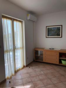 TV a/nebo společenská místnost v ubytování Apartments Bodi