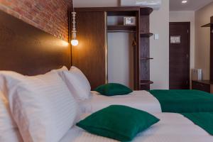 Hotel BLOOM Batumi客房内的一张或多张床位
