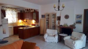 Kuchyň nebo kuchyňský kout v ubytování Villa Georgia Poseidi