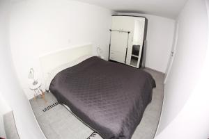 Posteľ alebo postele v izbe v ubytovaní Apartman Kupa