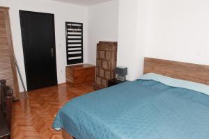 Posteľ alebo postele v izbe v ubytovaní Apartman Kupa