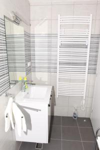 Kúpeľňa v ubytovaní Apartman Kupa