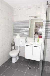 Kúpeľňa v ubytovaní Apartman Kupa