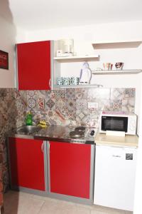 Kuchyňa alebo kuchynka v ubytovaní Apartman Kupa