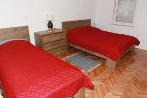 Posteľ alebo postele v izbe v ubytovaní Apartman Kupa
