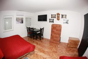 Posedenie v ubytovaní Apartman Kupa