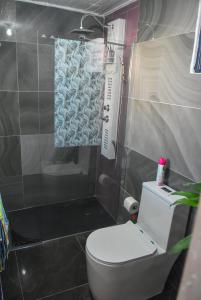 Ένα μπάνιο στο Apartmento Costambar Puerto Plata