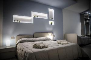 Postel nebo postele na pokoji v ubytování URBAN RELAX