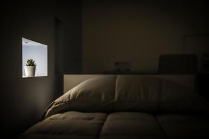 Postel nebo postele na pokoji v ubytování URBAN RELAX