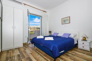 Posteľ alebo postele v izbe v ubytovaní Apartments Rija