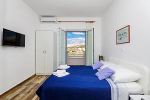 Posteľ alebo postele v izbe v ubytovaní Apartments Rija