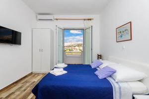 Posteľ alebo postele v izbe v ubytovaní Apartments Rija
