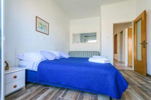 Posteľ alebo postele v izbe v ubytovaní Apartments Rija