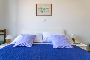 Posteľ alebo postele v izbe v ubytovaní Apartments Rija