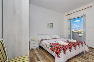 Posteľ alebo postele v izbe v ubytovaní Apartments Rija