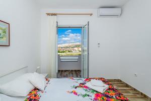 Posteľ alebo postele v izbe v ubytovaní Apartments Rija