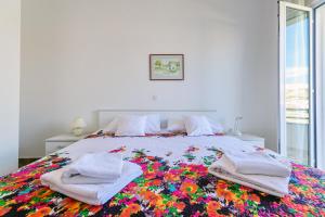 Posteľ alebo postele v izbe v ubytovaní Apartments Rija
