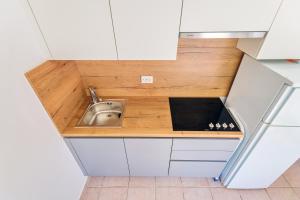 Kuchyňa alebo kuchynka v ubytovaní Apartments Rija