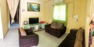 Fotografie z fotogalerie ubytování Homestay Villa Teluk Batik v destinaci Lumut + 6 fotografií