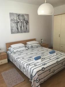 Postel nebo postele na pokoji v ubytování Apartment Ljilja