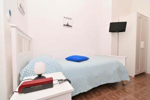 Telewizja i/lub zestaw kina domowego w obiekcie Villa Panoramica - Ischia Ponte