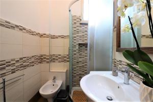 Koupelna v ubytování Painter House + 38 fotografií