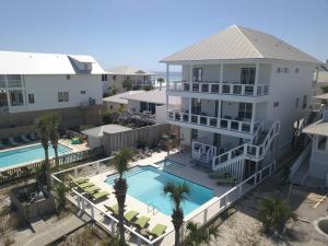 an aerial view of a house with a swimming pool at Seaspray in Santa Rosa Beach