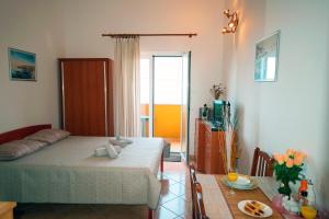 Postel nebo postele na pokoji v ubytování STUDIO APARTMAN STARA BAŠKA