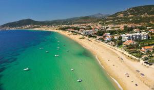 an aerial view of a beach with boats in the water at Rent House Karavi in Iraklitsa