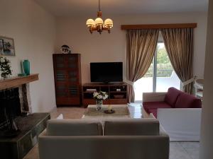 Villa Anastasia tesisinde bir oturma alanı