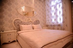 Apartment for Rent on Deribasovskaya street tesisinde bir odada yatak veya yataklar