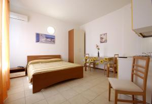 A bed or beds in a room at Residence Nobel