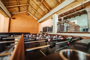 a room with rows of tables with dolls on them at Kotantik bed & breakfast in San Crist&oacute;bal de Las Casas