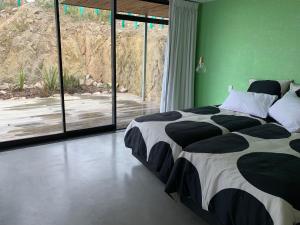 Ένα ή περισσότερα κρεβάτια σε δωμάτιο στο Secluded Getaway