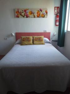 Katil atau katil-katil dalam bilik di 8 Calle Tangara La gloria